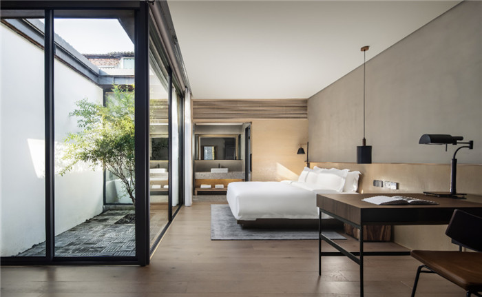 酒店客房設(shè)計-集書店、咖啡、美術(shù)館于一體的精品酒店設(shè)計方案