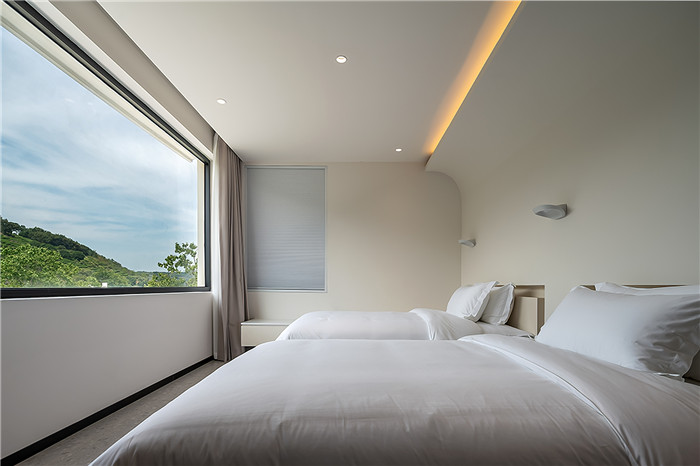 10間房的白色極簡風(fēng)漫心島民宿設(shè)計案例 10間房的白色極簡風(fēng)漫心島民宿設(shè)計案例